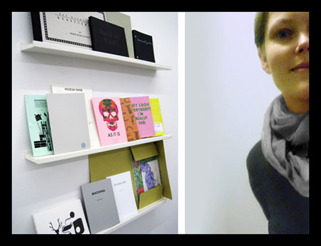 Sara Gunn syns till hlften vid en bokhylla