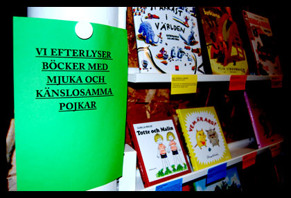 grn skylt med texten: Vi efterlyser bcker med mjuka och knslosamma pojkar